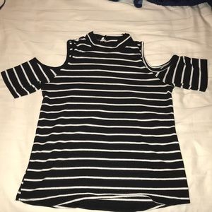 turtle neck shirt with holes in the shoulder